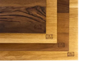 Hochwertige Holz-Schneidebretter mit NXT Board Logo, nachhaltig und ideal für die Küche