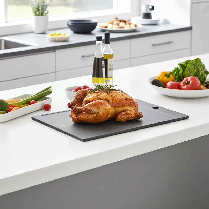 Planche à découper noire avec ligne de jus – Votre partenaire de cuisine fiable pour une cuisson sans effort ! - NXT Board